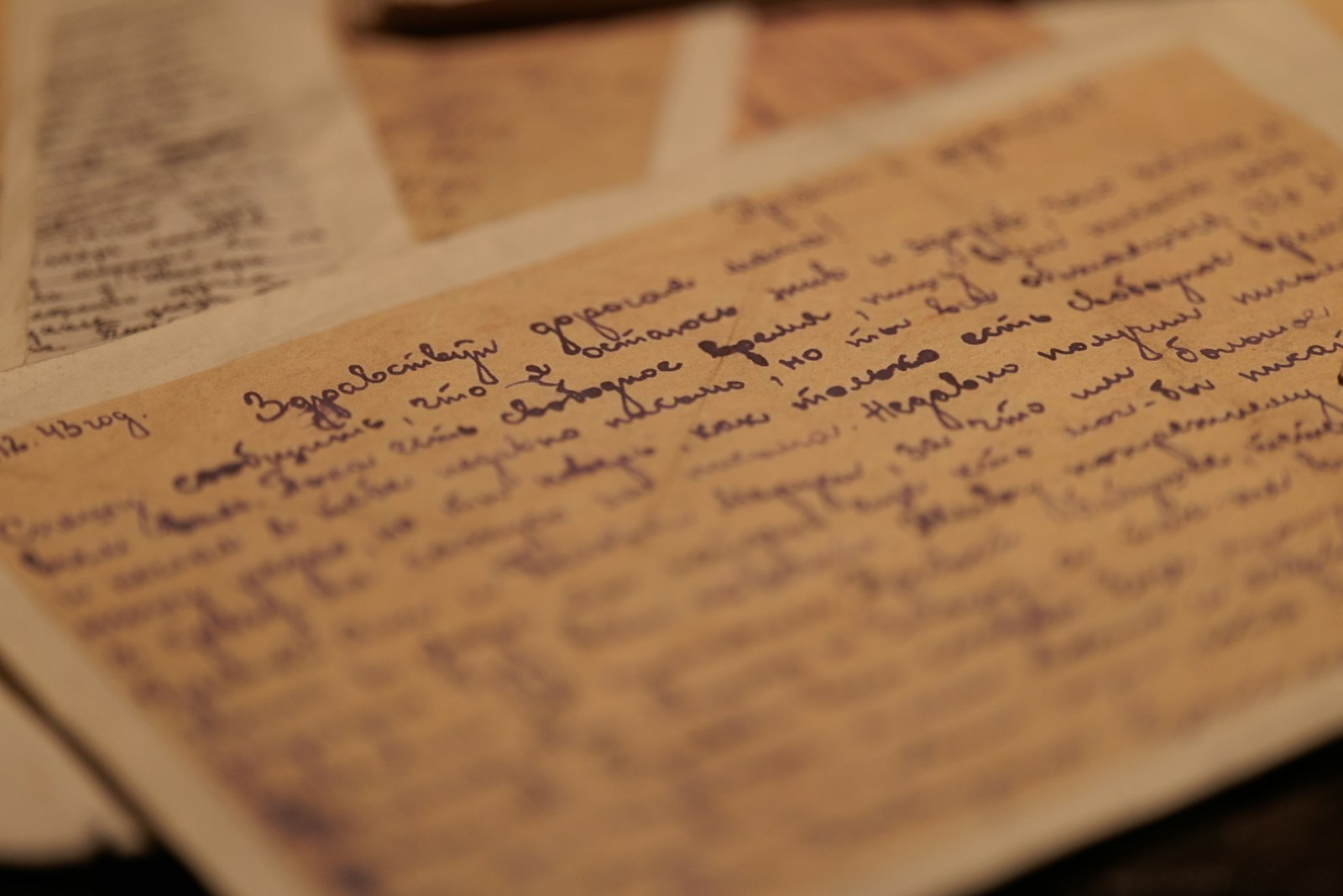 Handwritten notes in blue ink on aged paper.